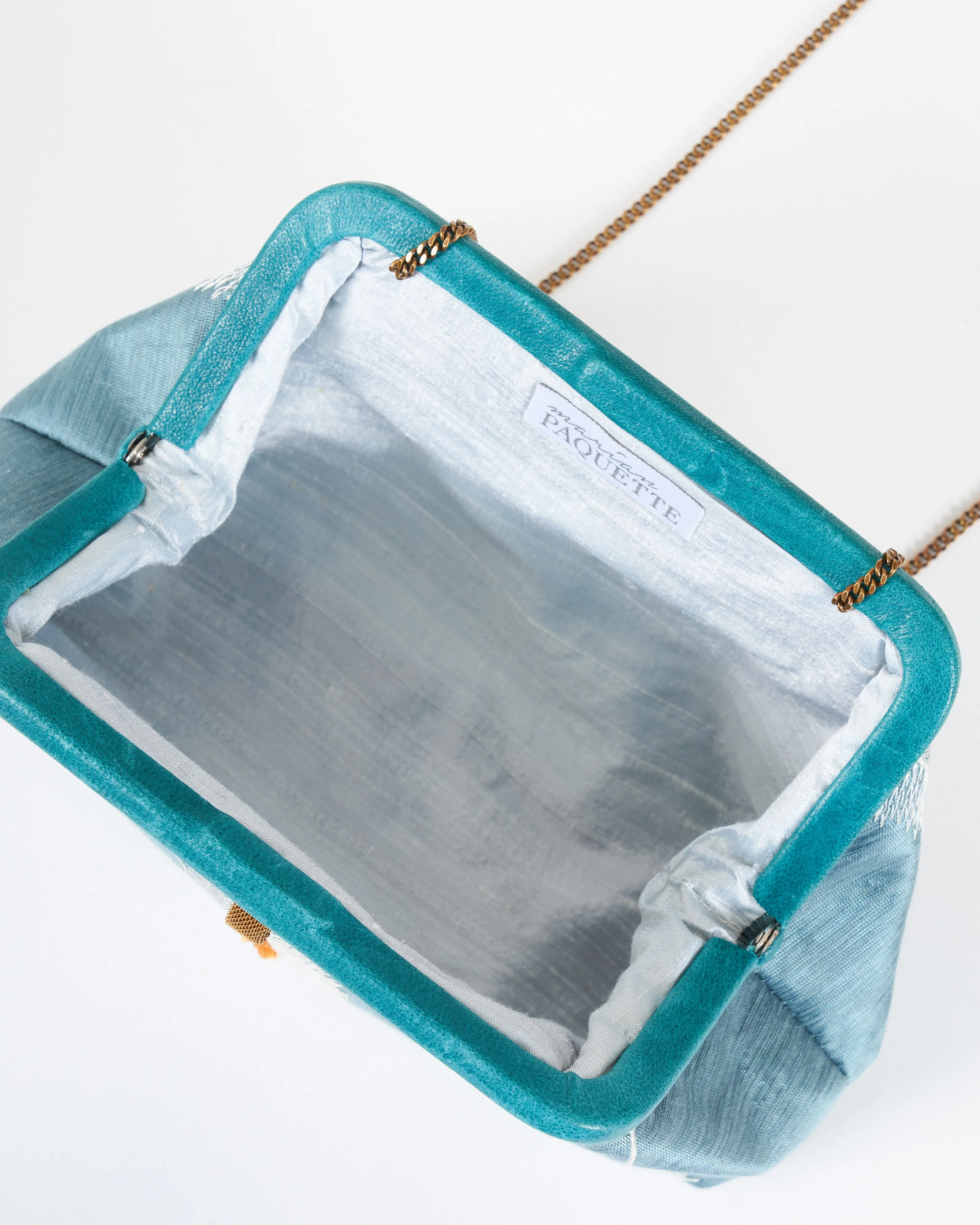liette embroidered clutch - teal/white/orange